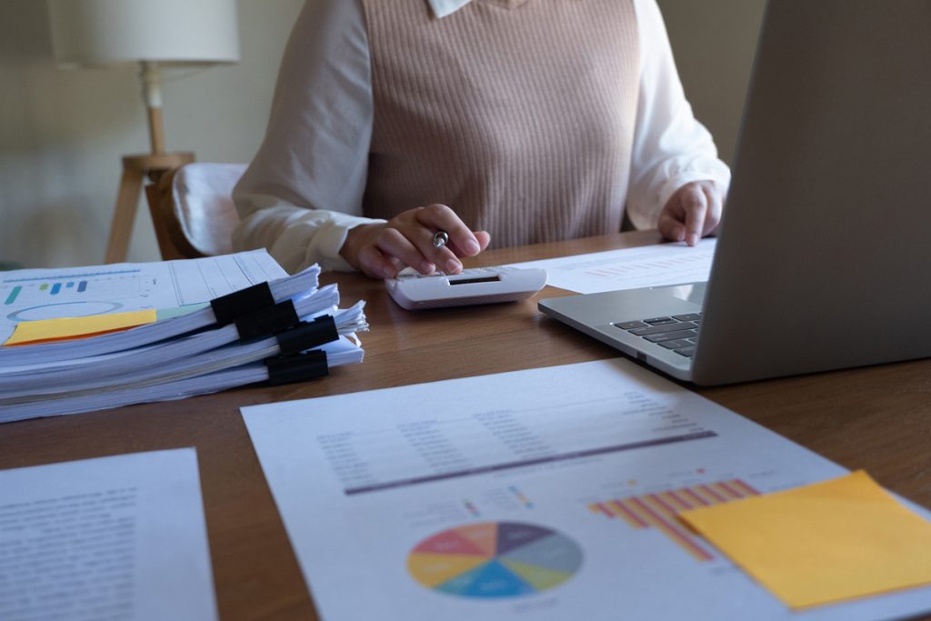 A female accountant looking over some graphs